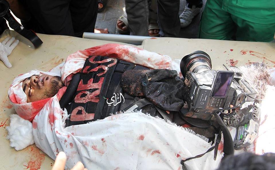 صور مجزرة حي الشجاعية غزة قتل صحفي